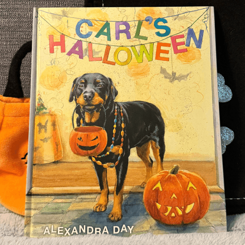 Carl's Halloween picture book cover showing the dog Carl with a Halloween basket for trick-or-treating
